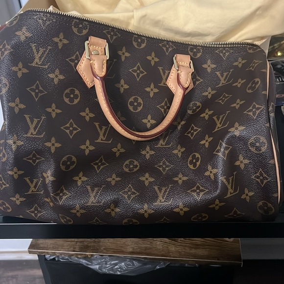 Selling a Louis Vuitton, two of them. - Picture 3 of 16